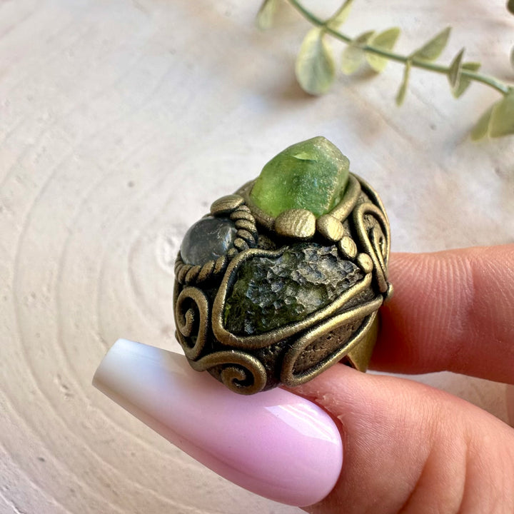 Handmade Moldavite with Peridot and Clear Topaz adjustable ring featuring genuine natural gemstones in a unique artisan design.