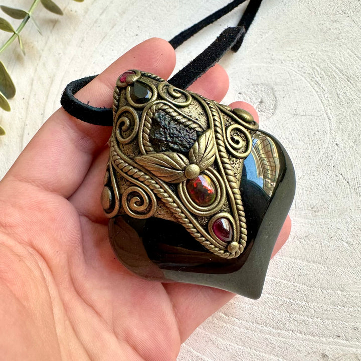 One of a kind healing crystal pendant with Black Ethiopian Opal and deep red Rhodolite Garnet.