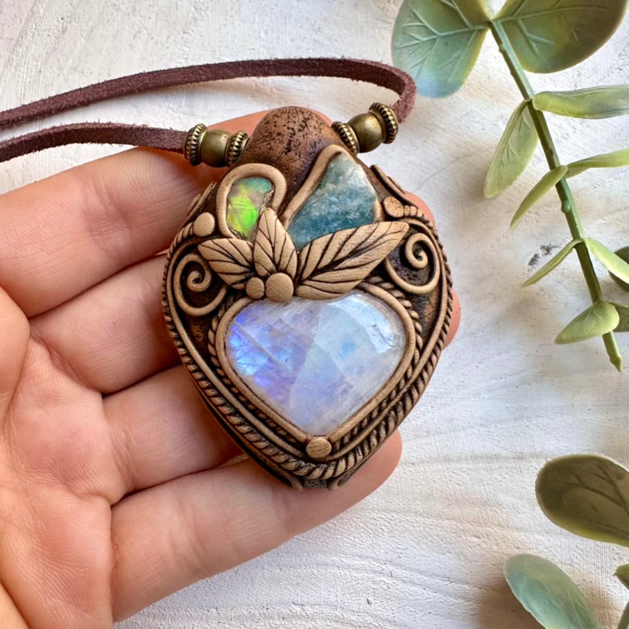 Handmade necklace featuring rainbow moonstone raw aquamarine and opal
