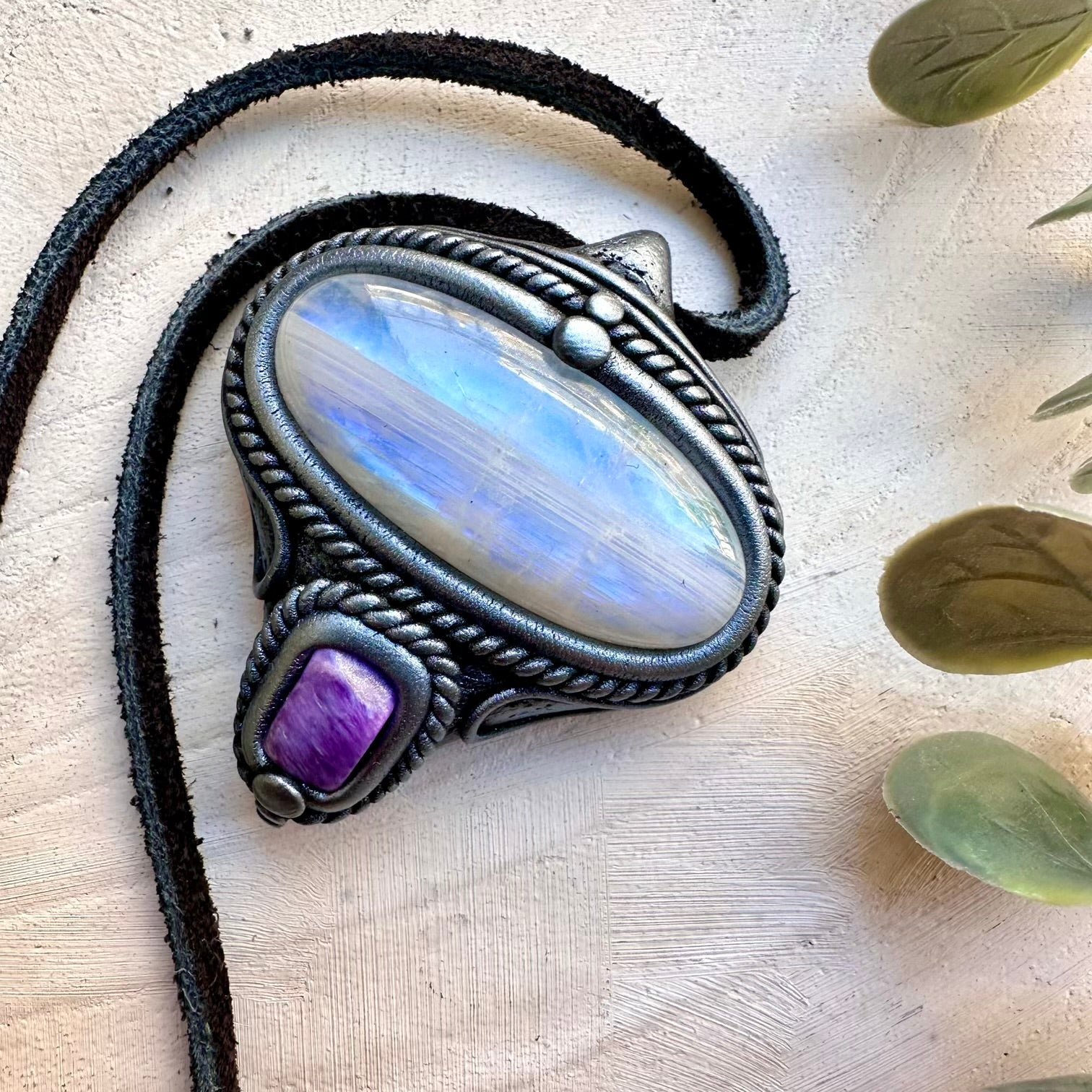 Spiritual crystal necklace featuring rainbow moonstone and charoite