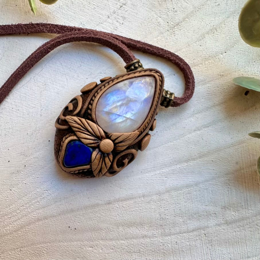 Handmade necklace featuring rainbow moonstone and lapis lazuli