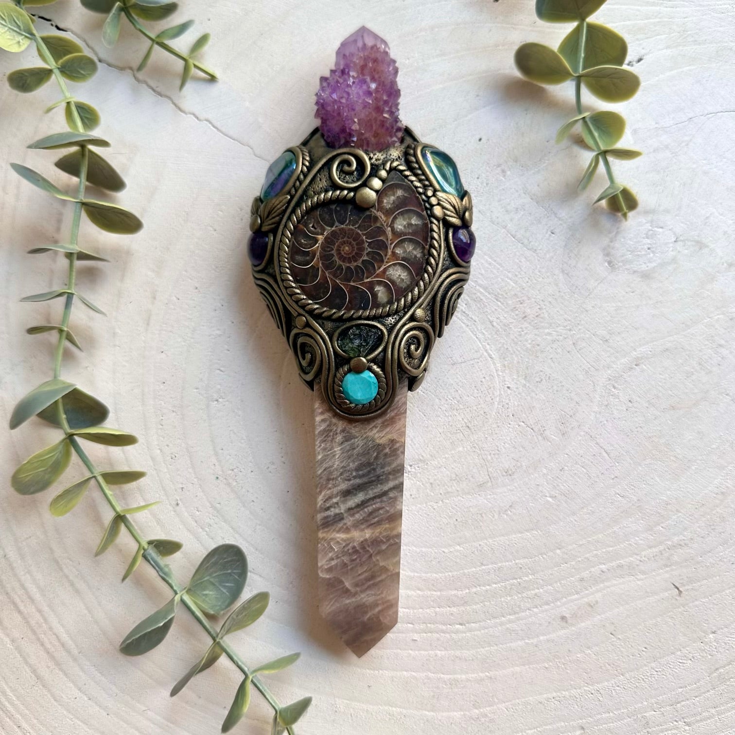 Handmade Moonstone Point crystal wand featuring Deep Purple Spirit Quartz, Ammonite, Aqua Aura Quartz, Amethyst, Amazonite and Moldavite, a one of a kind healing energy tool designed for intuition, transformation, spiritual awakening and inner balance. 