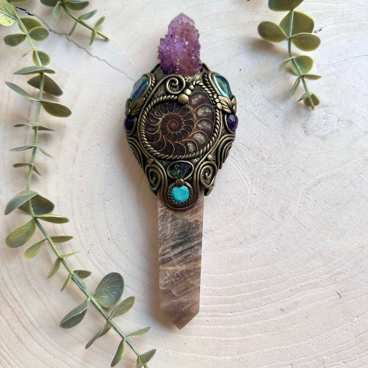 Handmade Moonstone Point crystal wand featuring Deep Purple Spirit Quartz, Ammonite, Aqua Aura Quartz, Amethyst, Amazonite and Moldavite, a one of a kind healing energy tool designed for intuition, transformation, spiritual awakening and inner balance. 