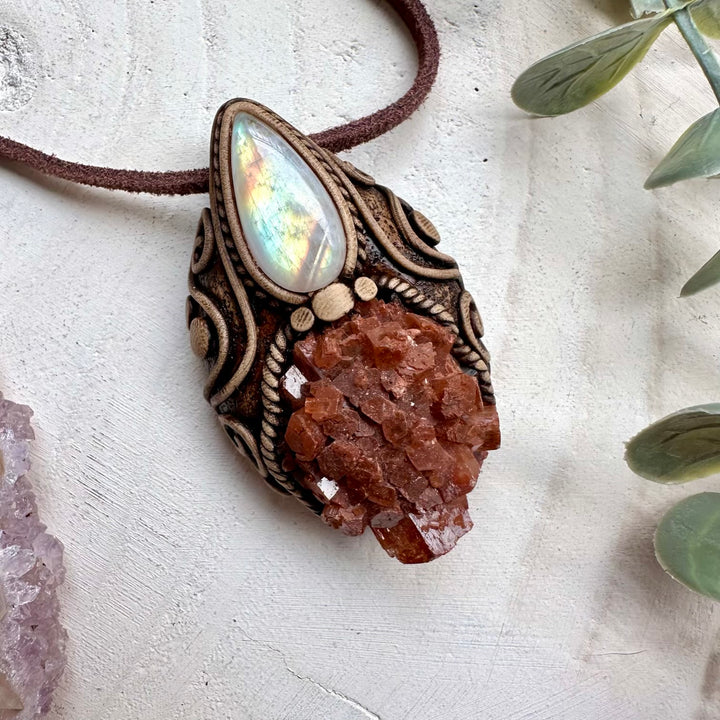 Aragonite paired with rainbow moonstone in a necklace