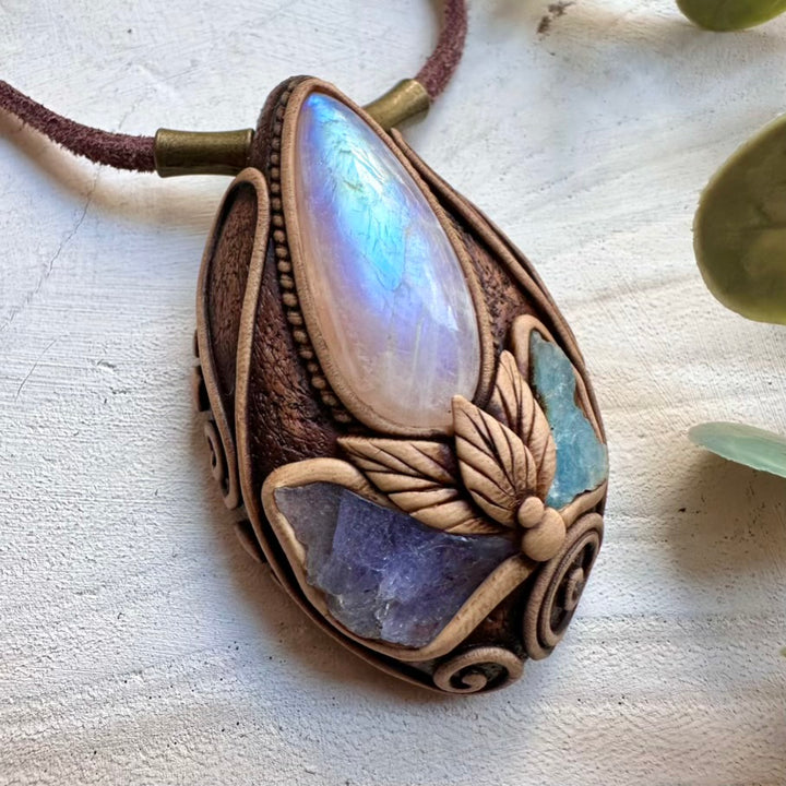 Protection necklace with raw tanzanite and rainbow moonstone