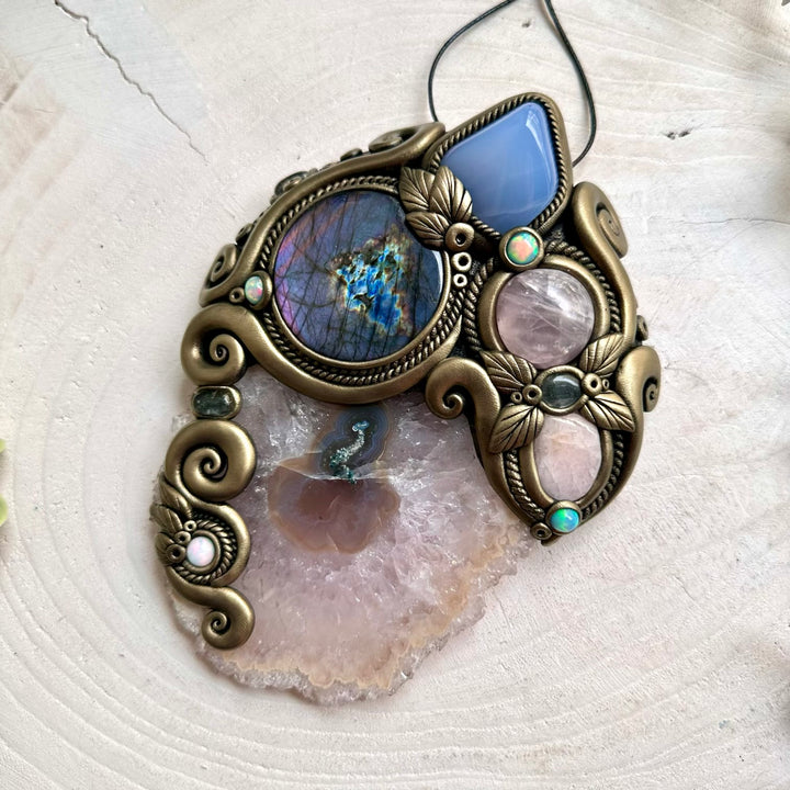 Gemstone wall decoration featuring natural Amethyst Stalactite, Blue Chalcedony and Clear Topaz, traditionally associated with clarity, calmness and spiritual awareness.