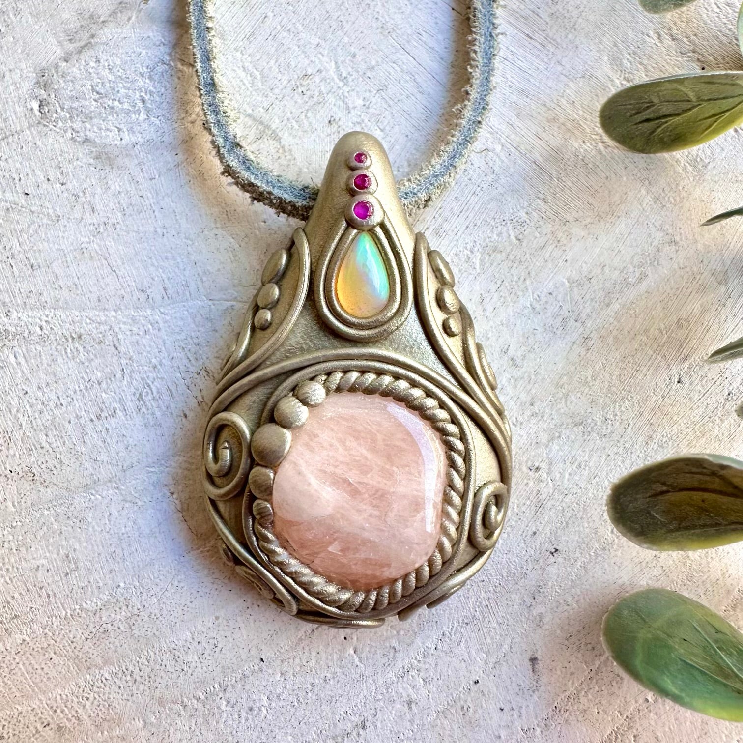Handmade Morganite, Ethiopian Opal and Ruby necklace, a one of a kind healing crystal jewelry piece combining delicate pink Morganite with mesmerizing Opal flashes and vibrant Ruby. An enchanting spiritual gemstone necklace for love, creativity, emotional healing, passion, confidence and personal transformation.