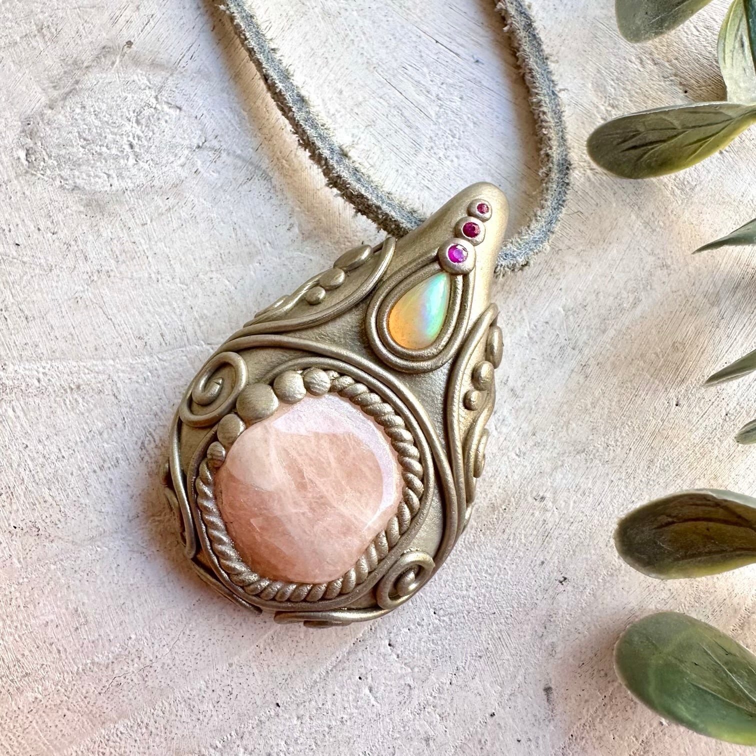 One of a kind handmade necklace combining gentle pink Morganite with colorful Ethiopian Opal and Ruby.