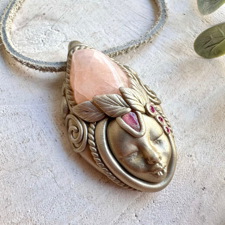 Handmade metaphysical crystal jewelry showcasing Morganite, Ruby and Pink Tourmaline.