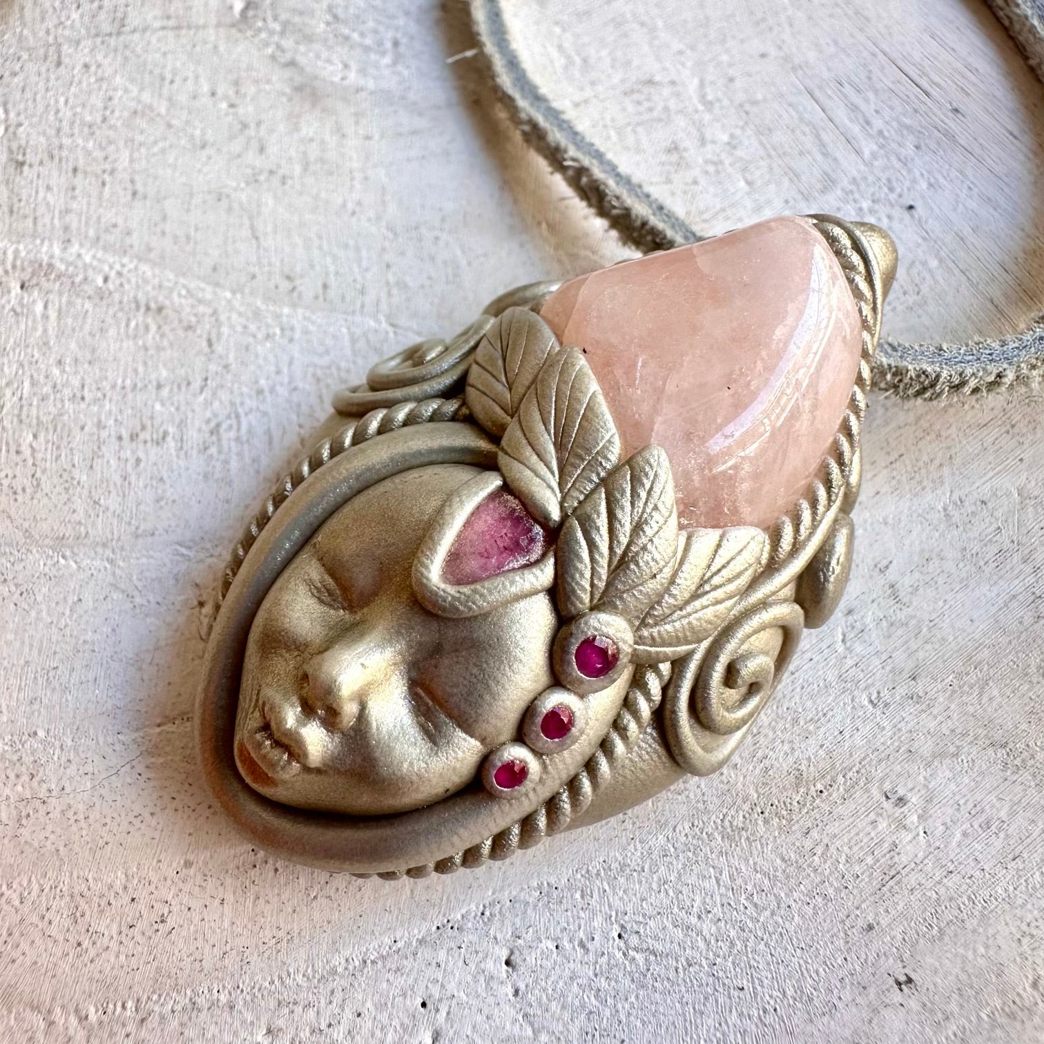 One of a kind handmade jewelry featuring soft pink and rich red natural gemstones.