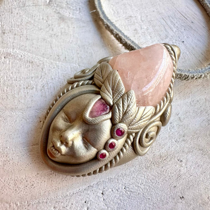 One of a kind handmade jewelry featuring soft pink and rich red natural gemstones.