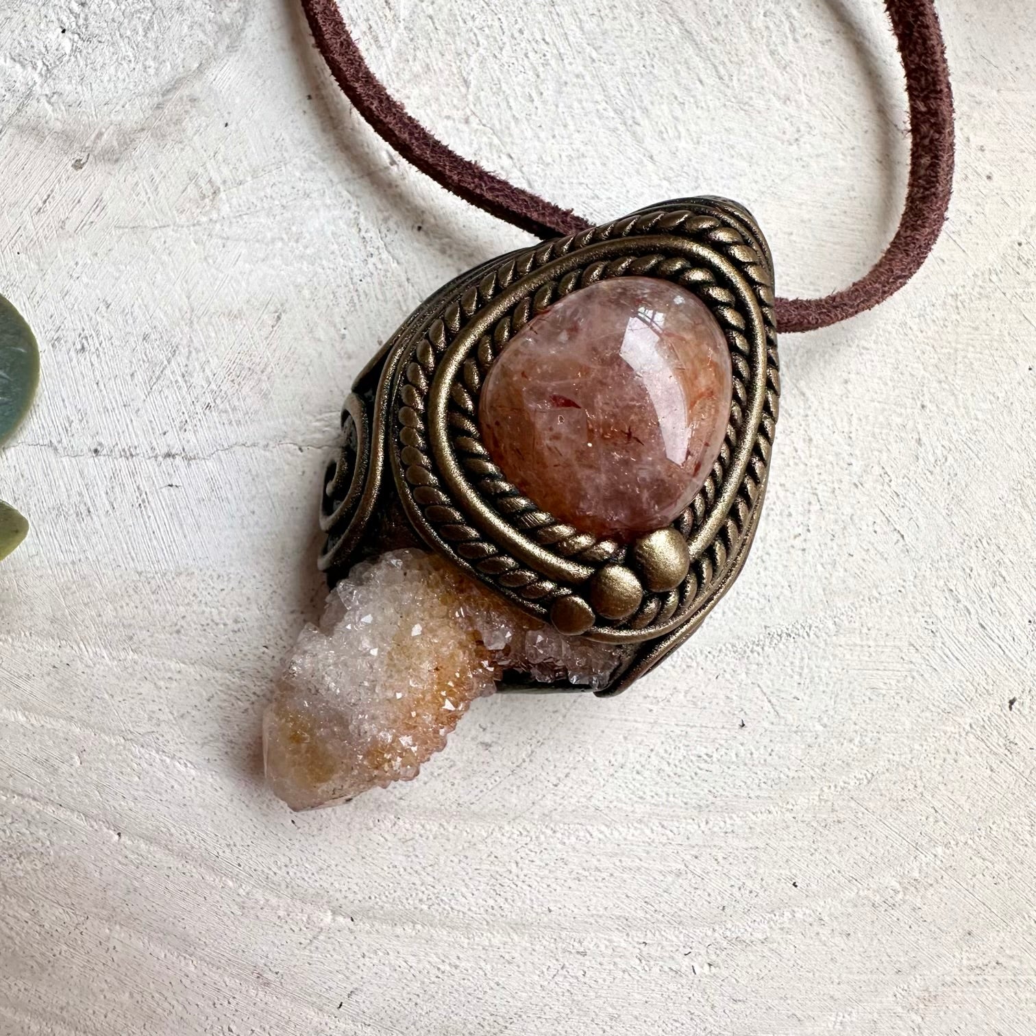 Healing crystal necklace handcrafted with natural Spirit Quartz and Hematite Quartz gemstones.