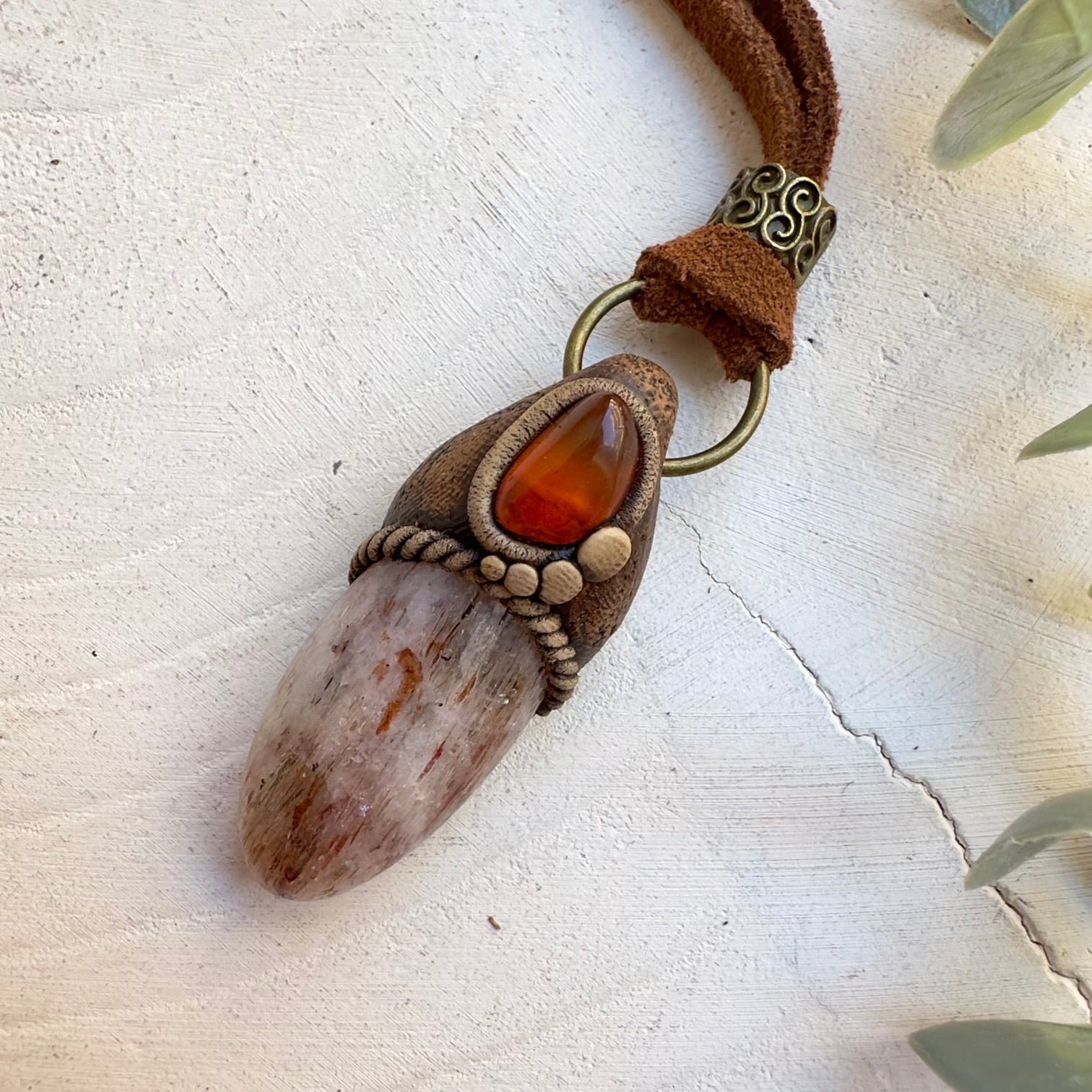 Unisex boho crystal jewelry featuring Hematite Quartz and Amber