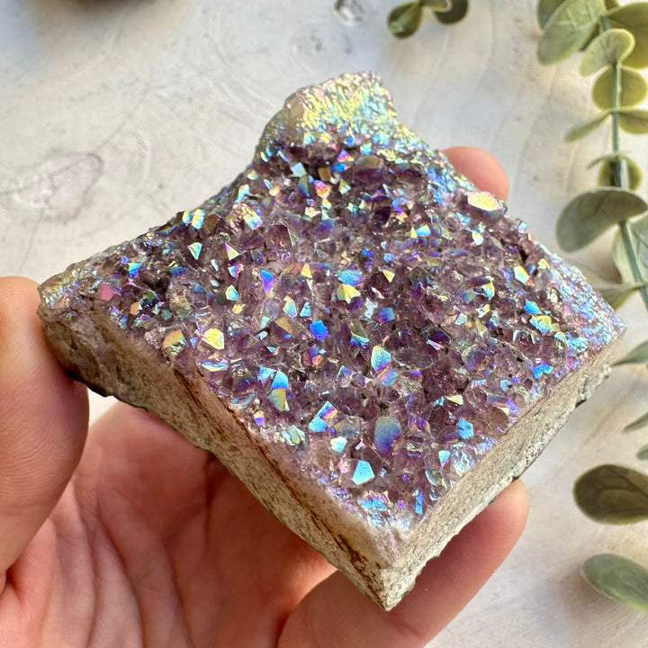 Amethyst cluster crystal with rainbow aura effect