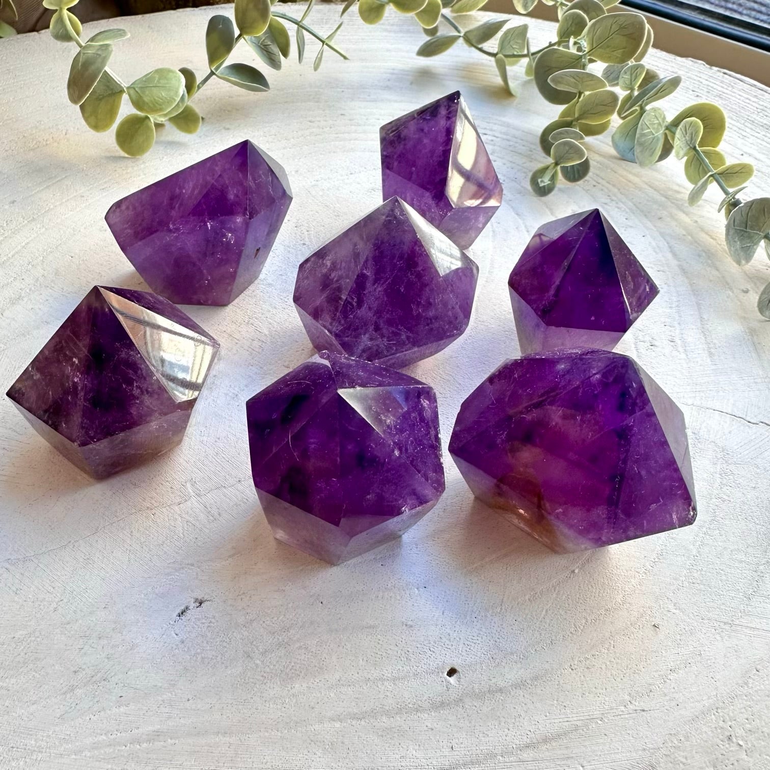 Polished amethyst crystal point natural mineral specimen