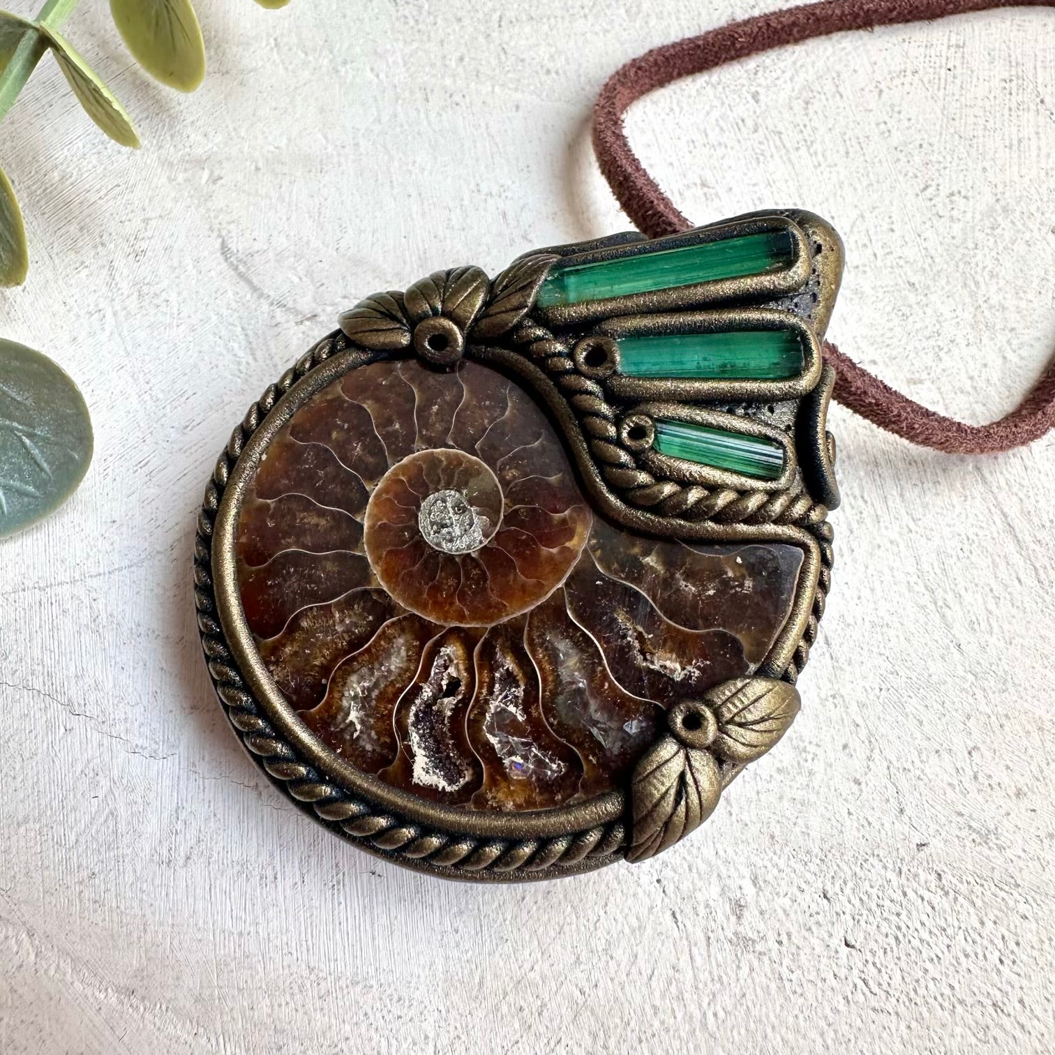 Natural ammonite pendant necklace with green tourmaline healing gemstone accents