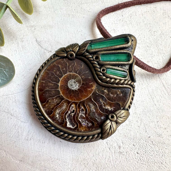Natural ammonite pendant necklace with green tourmaline healing gemstone accents