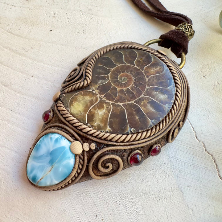 Natural fossil pendant with Larimar and garnet gemstones