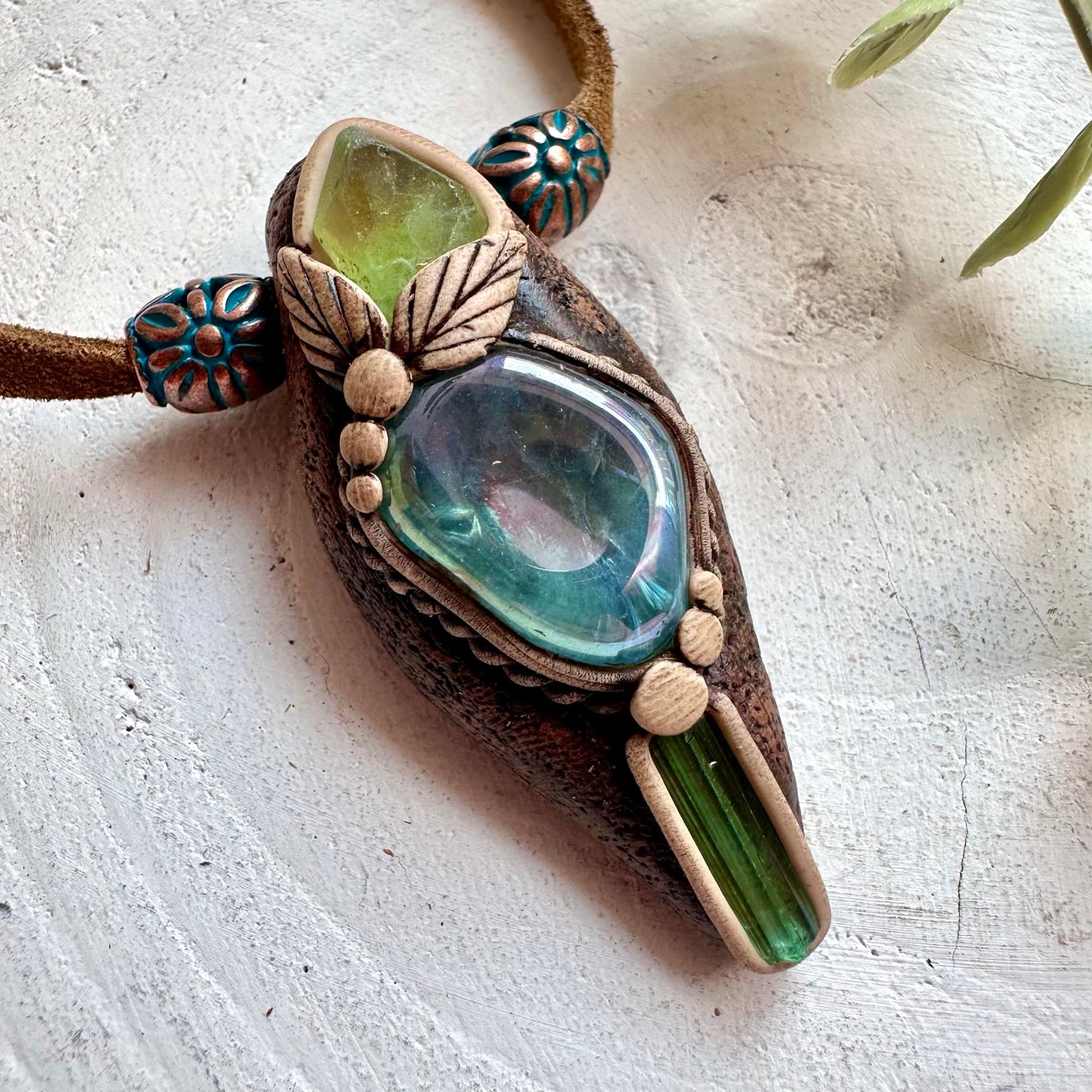 Spiritual crystal necklace featuring Aqua Aura Quartz, Peridot and Green Tourmaline for positive energy