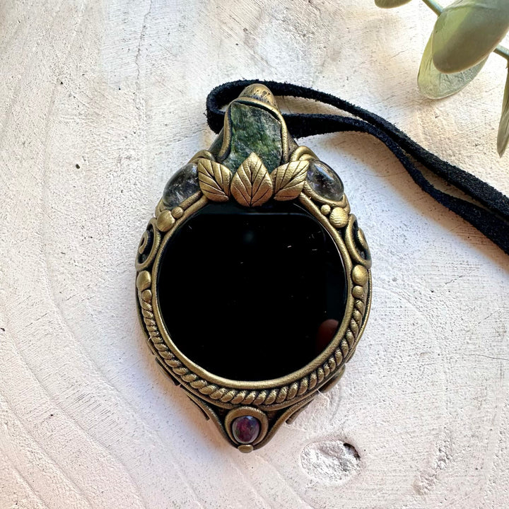 Spiritual crystal jewelry with Black Obsidian Mirror, Clear Topaz and Moldavite for a unique mystical look.