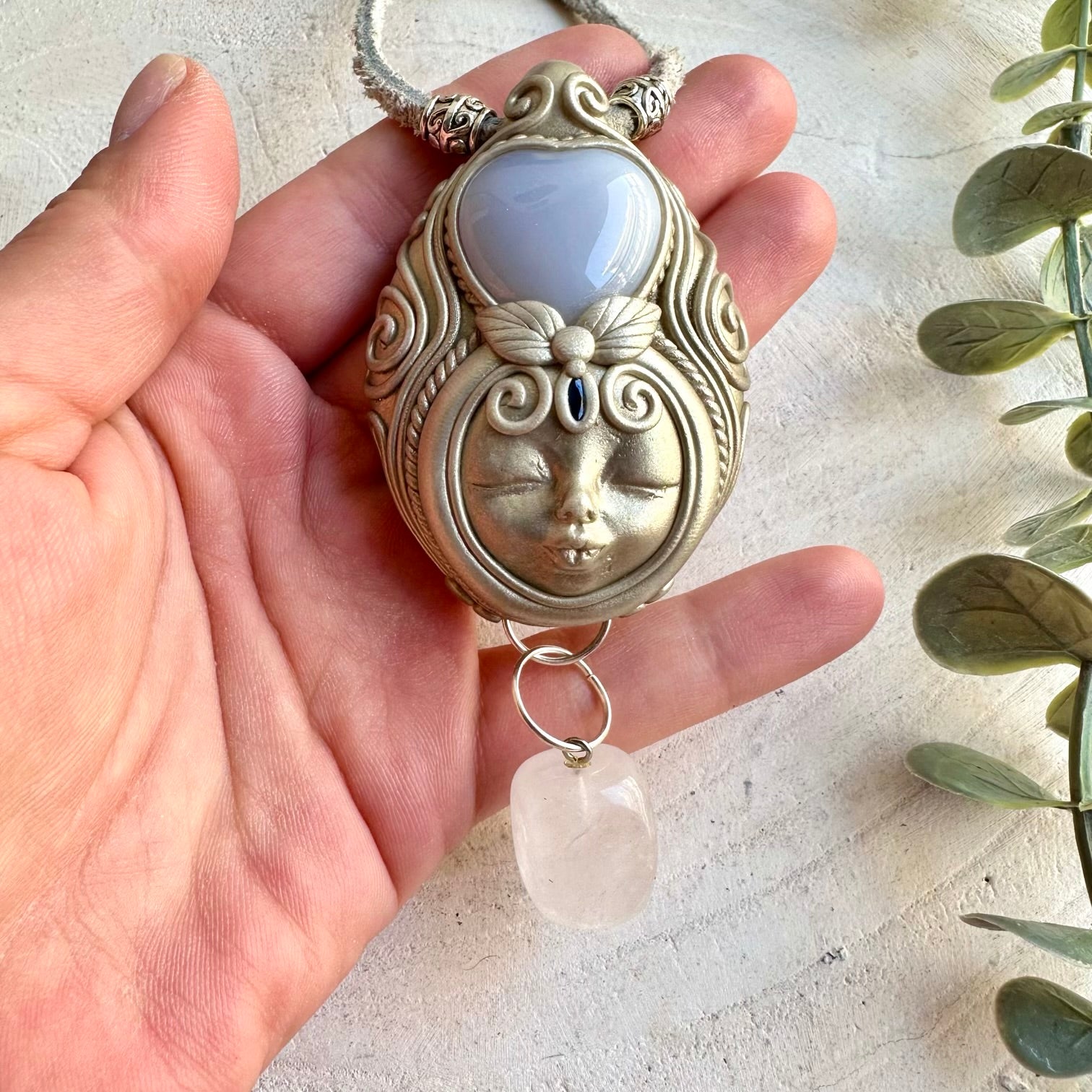 Handmade gemstone necklace combining Blue Chalcedony, Clear Quartz and deep blue Sapphire.