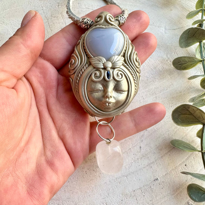 Handmade gemstone necklace combining Blue Chalcedony, Clear Quartz and deep blue Sapphire.