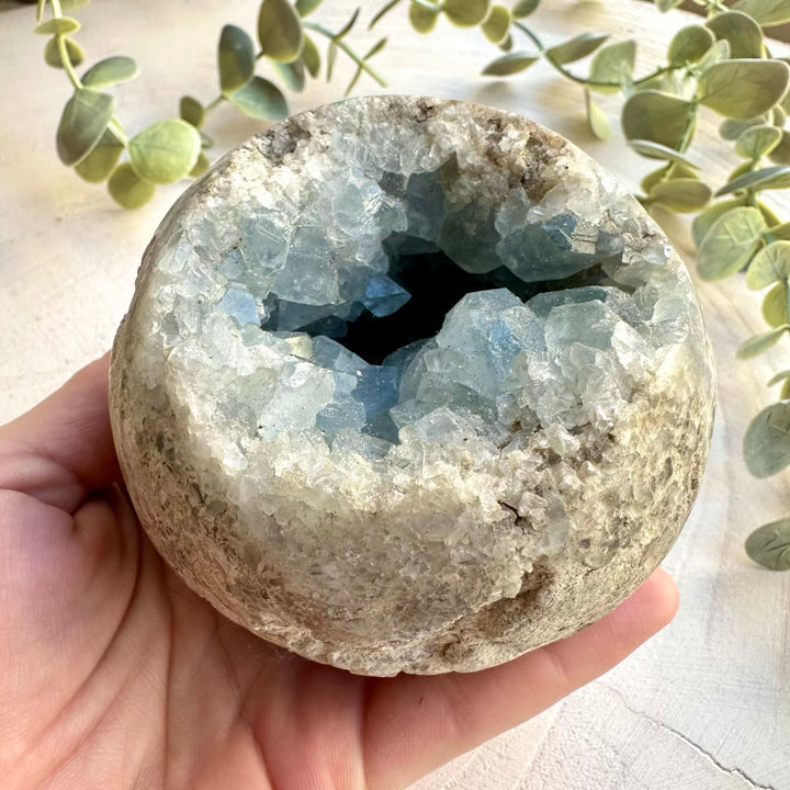 Close up of natural celestite crystal sphere