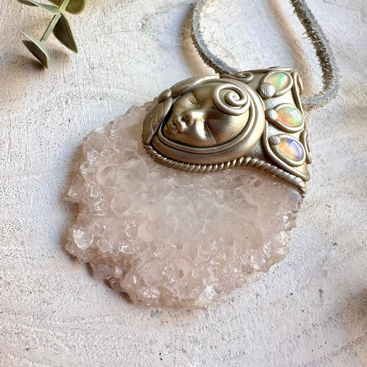 Unique Goddess pendant featuring a natural Quartz Stalactite Slice and iridescent Ethiopian Opal accents.