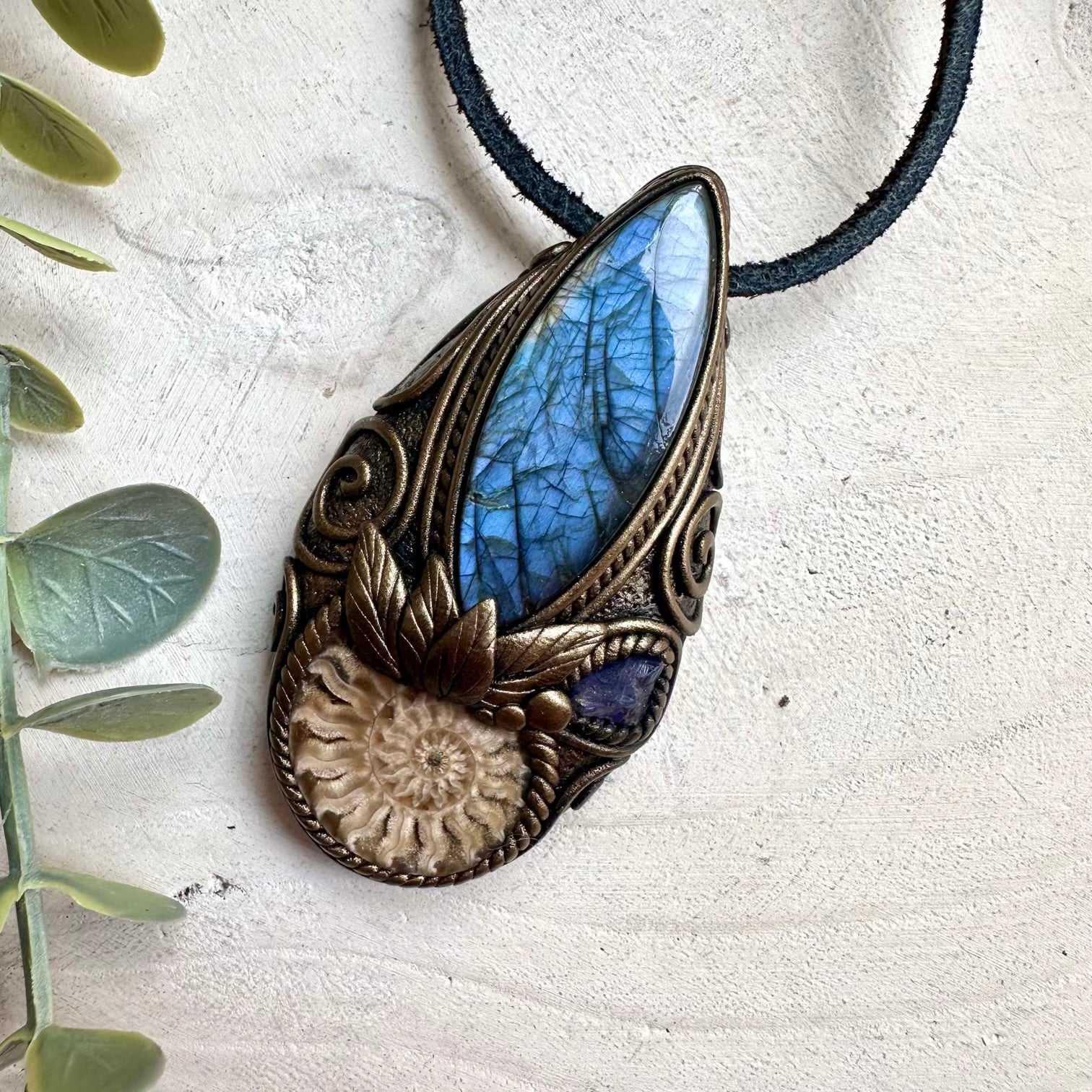 Spiritual gemstone necklace featuring Labradorite, Ammonite, and Tanzanite for intuition and positive energy.