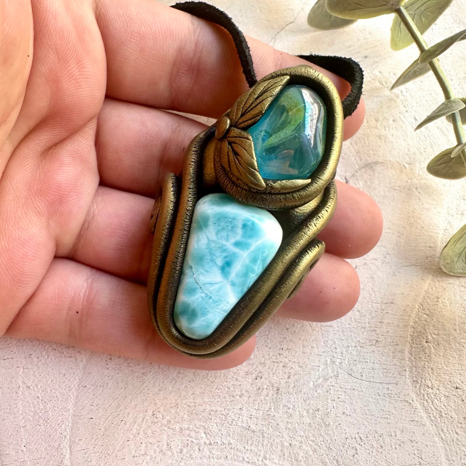 One of a kind gemstone pendant handcrafted with Larimar and Aqua Aura Quartz.