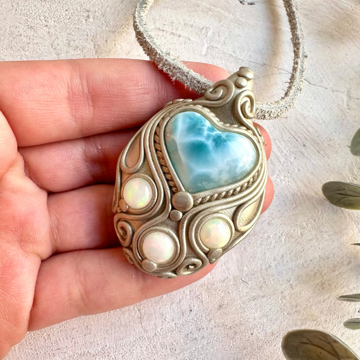 One of a kind gemstone necklace with a soft blue Larimar Heart and colorful Ethiopian Opal.