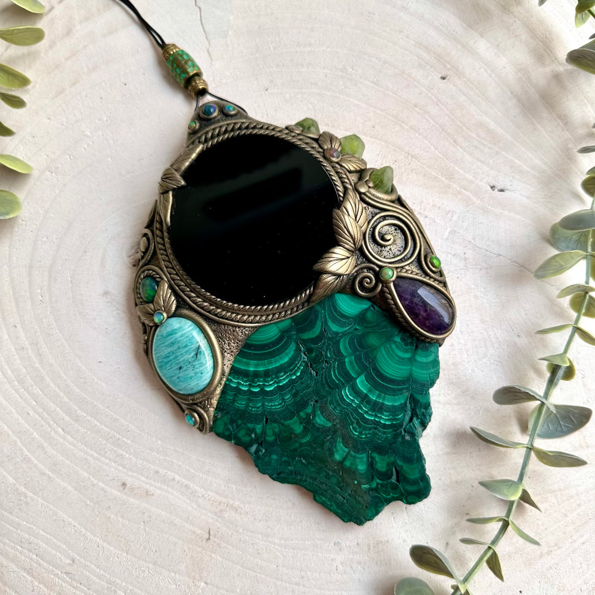Mystical wall hanging combining vivid green Malachite, soft blue Amazonite, purple Amethyst and natural Peridot.