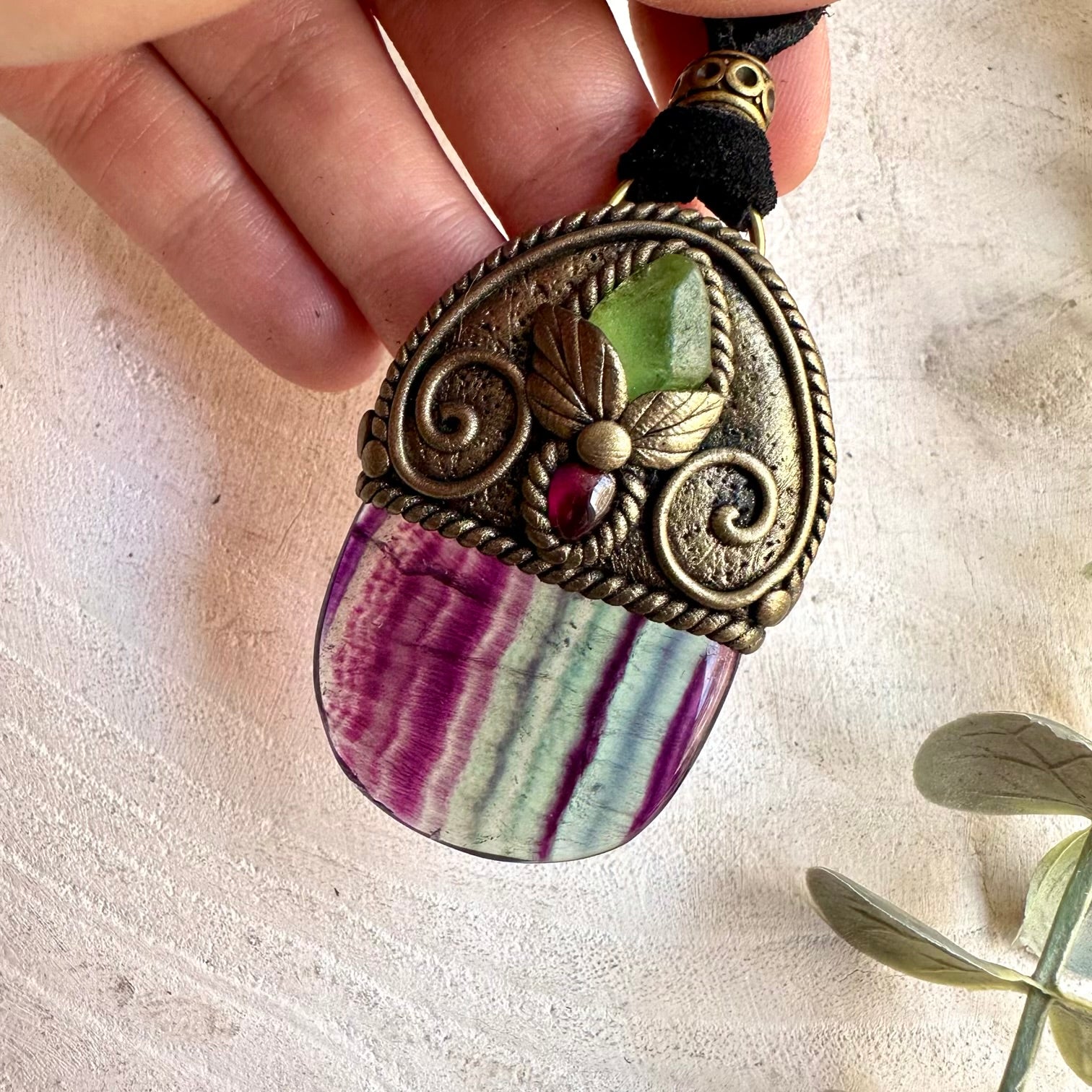 One of a kind crystal necklace with colorful Rainbow Fluorite, raw green Peridot and deep red Garnet.