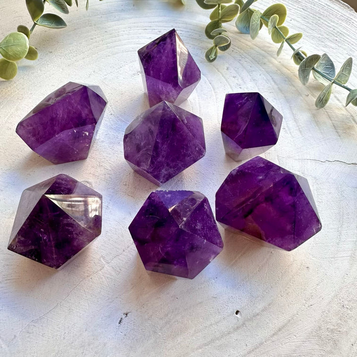 Natural amethyst crystal specimen with deep purple color