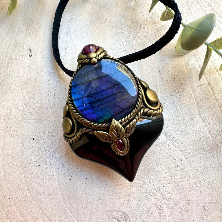 Healing crystal talisman featuring Rainbow Obsidian, Labradorite, Ruby and Rhodolite Garnet.