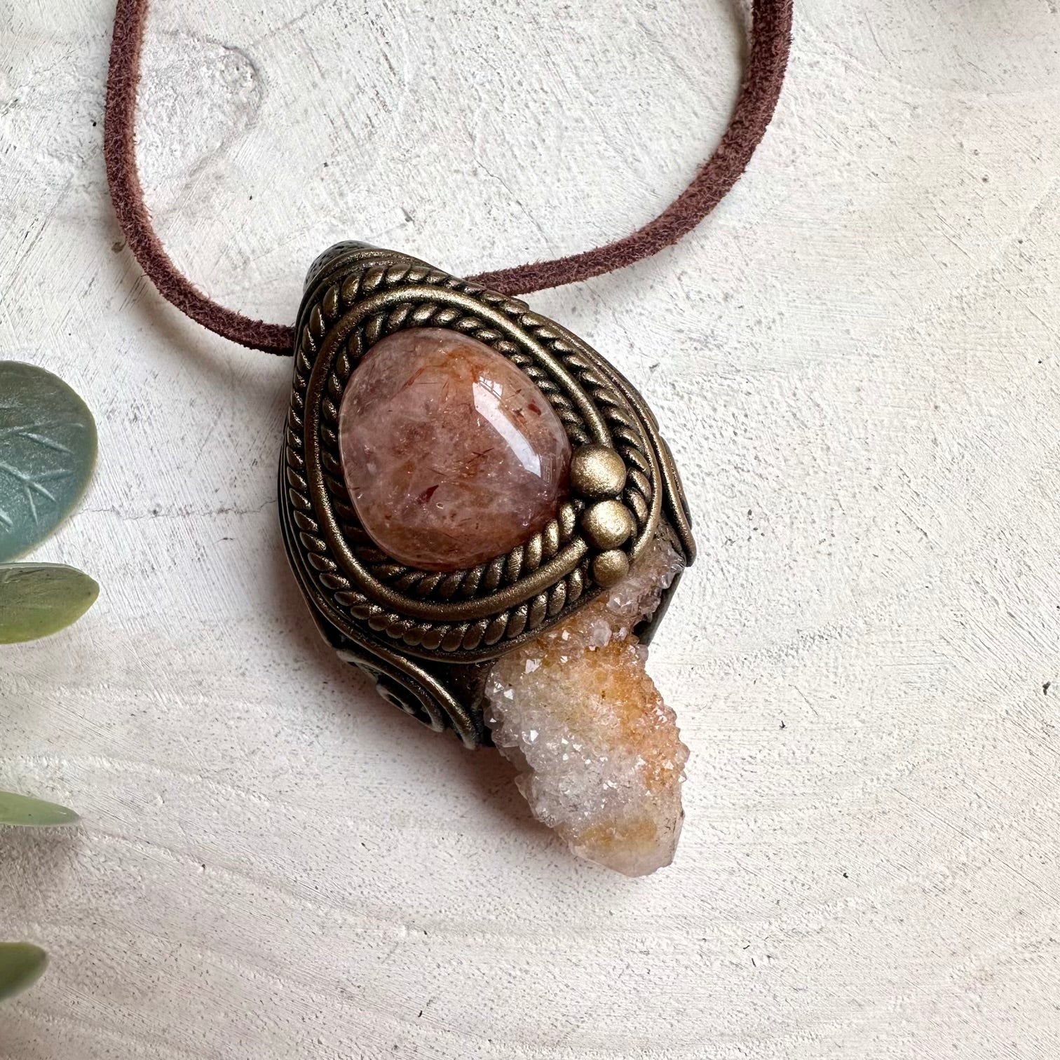 Spiritual gemstone necklace featuring Spirit Quartz and Hematite Quartz for energy cleansing and balance.
