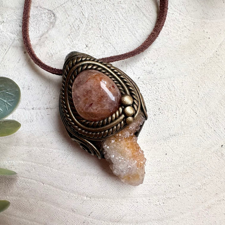 Spiritual gemstone necklace featuring Spirit Quartz and Hematite Quartz for energy cleansing and balance.