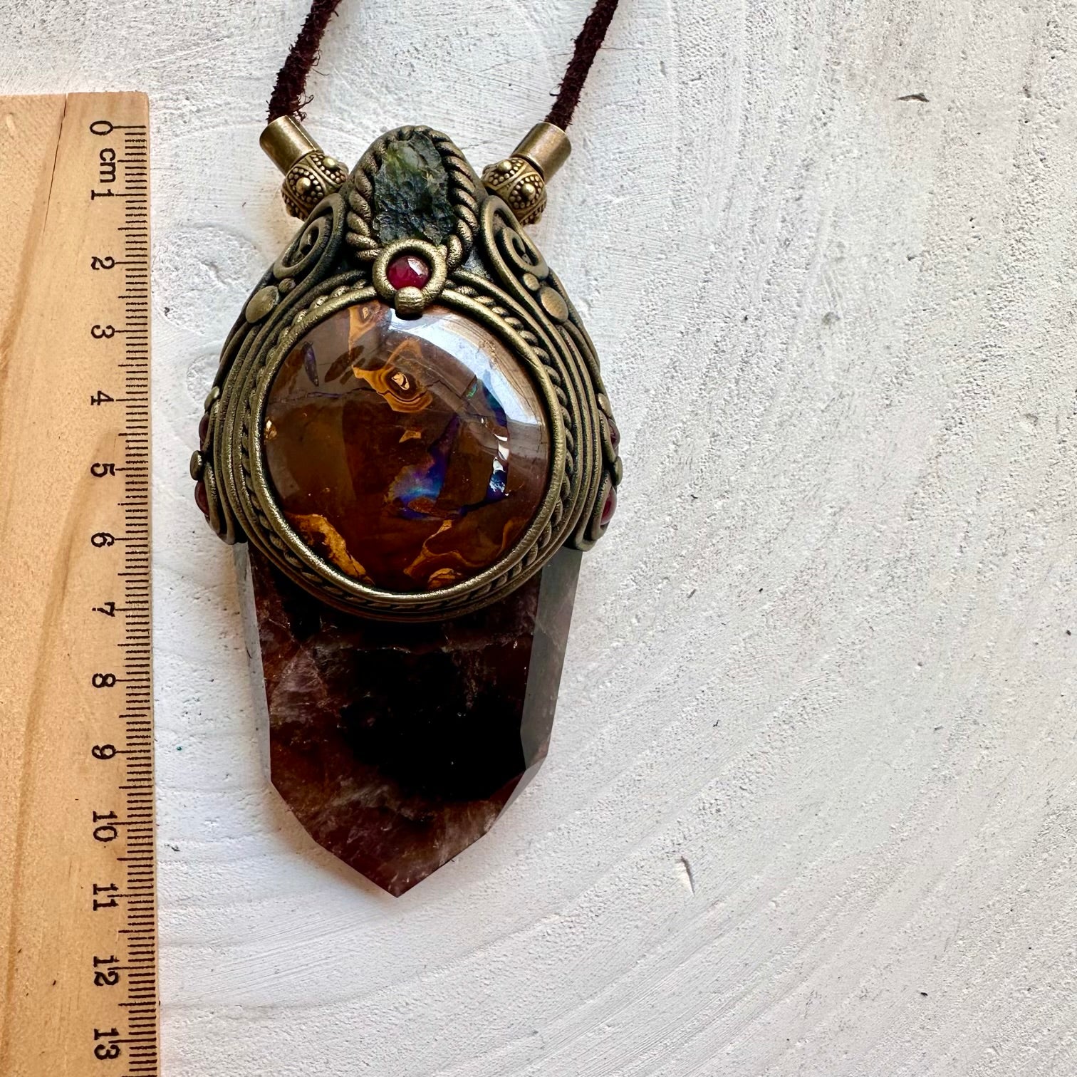 Unique artisan crystal wand featuring Super Seven Quartz with a stunning Boulder Opal centerpiece.