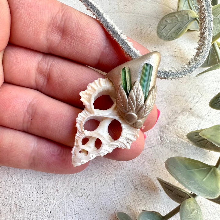 Handmade gemstone necklace combining shell and green tourmaline
