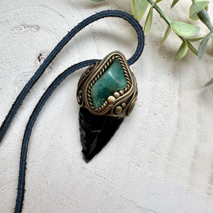 Energy pendant with obsidian arrowhead and emerald