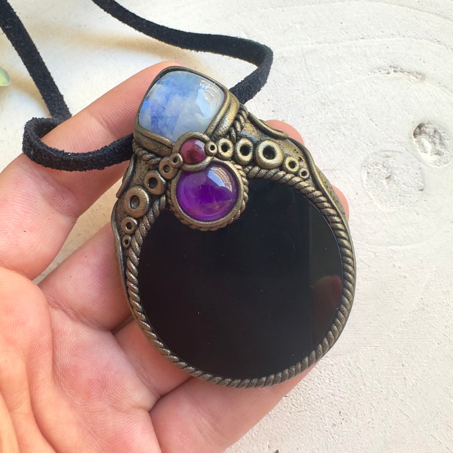 Protection amulet necklace featuring Black Obsidian mirror and healing crystals