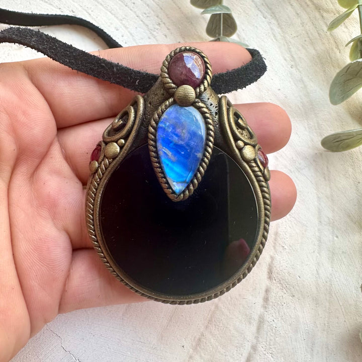 Spiritual protection amulet with Obsidian mirror pendant