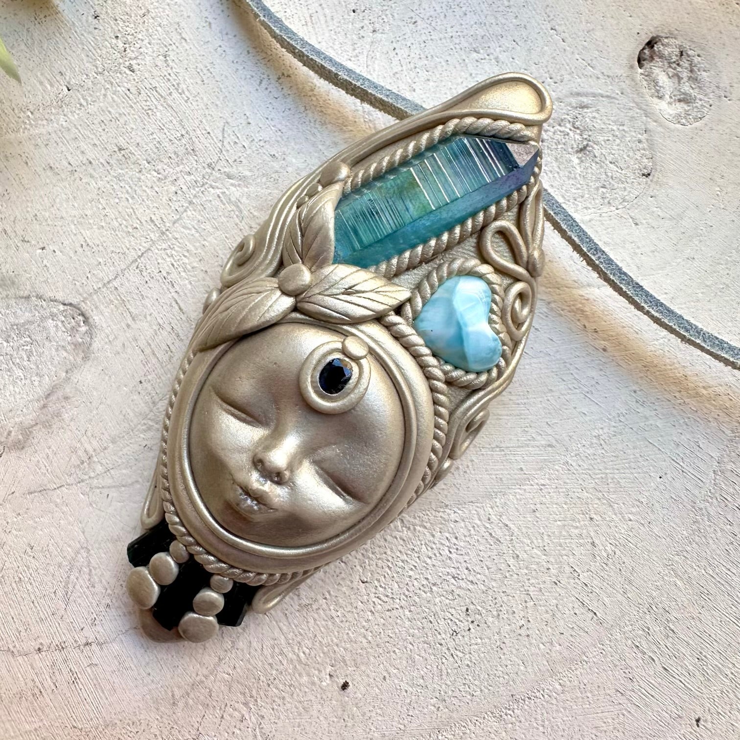 Healing crystal goddess pendant with larimar heart and blue sapphire