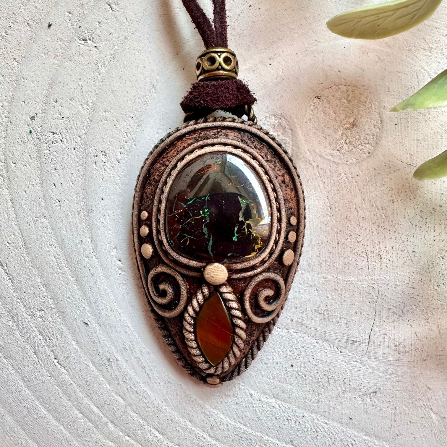 Boho gemstone necklace featuring Boulder Opal and vibrant Ammolite.