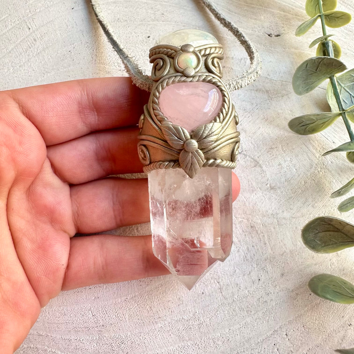 Handmade crystal wand pendant necklace featuring Clear Quartz, Rose Quartz Heart, Moonstone and Ethiopian Opal.