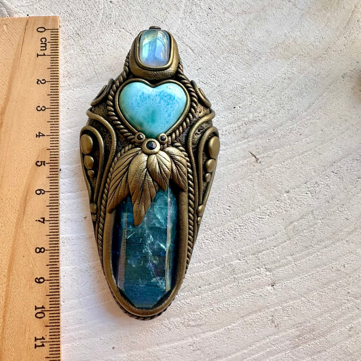 Handmade crystal wand pendant necklace with Aqua Aura Quartz, Larimar Heart, Rainbow Moonstone and Blue Sapphire.