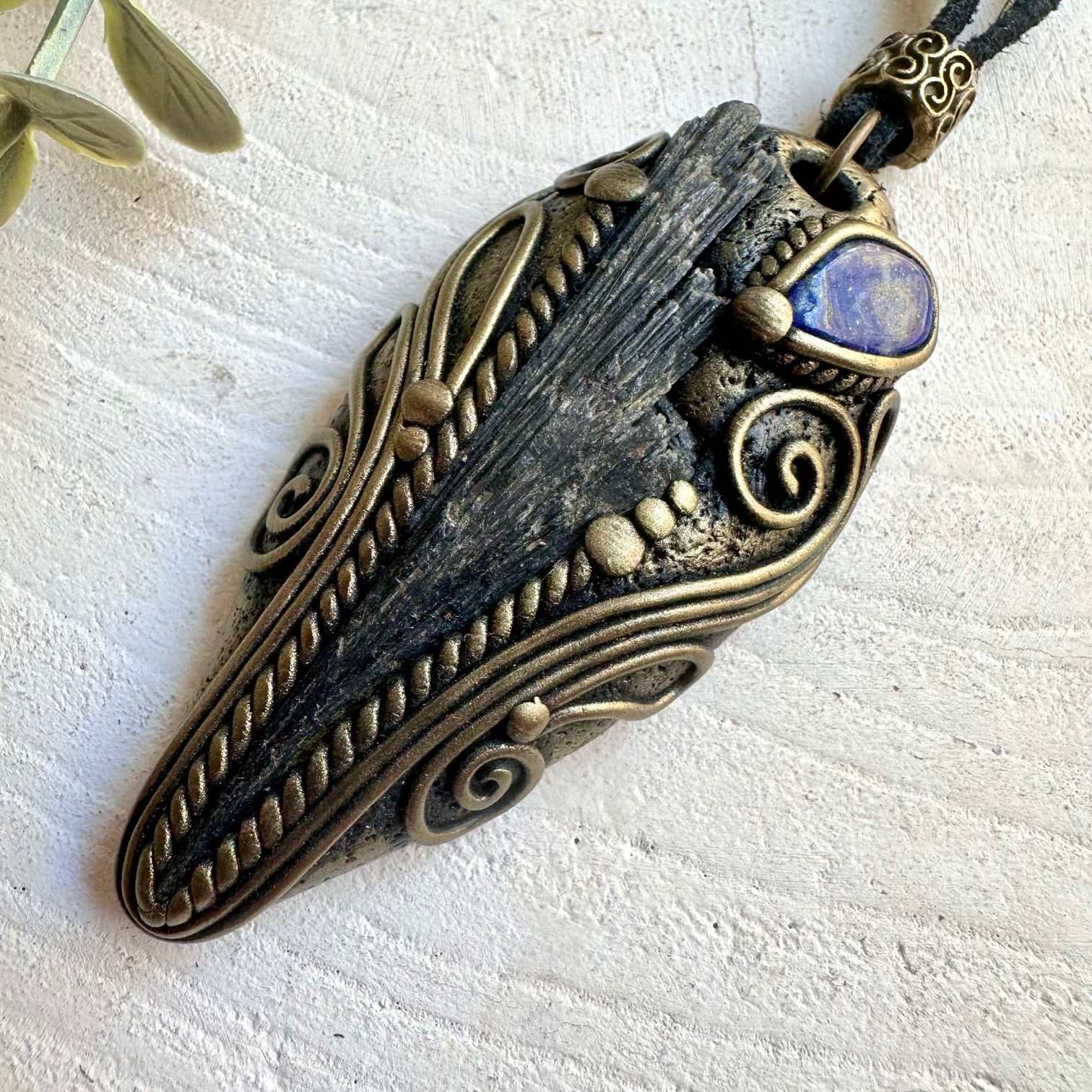 Natural gemstone jewelry showcasing Black Kyanite with the rich blue tones of Lapis Lazuli.