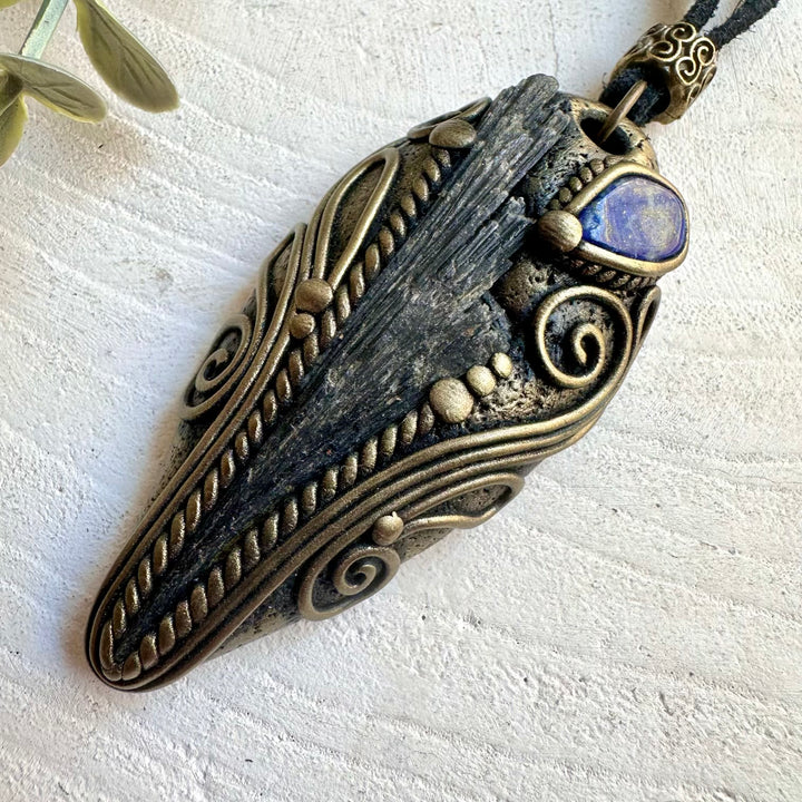 Natural gemstone jewelry showcasing Black Kyanite with the rich blue tones of Lapis Lazuli.