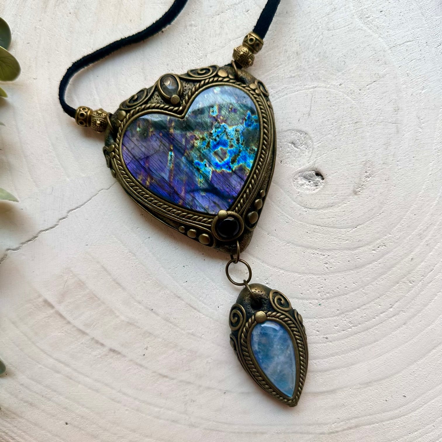 Boho gemstone pendant featuring a large Purple Labradorite heart with Rainbow Moonstone and Amethyst.