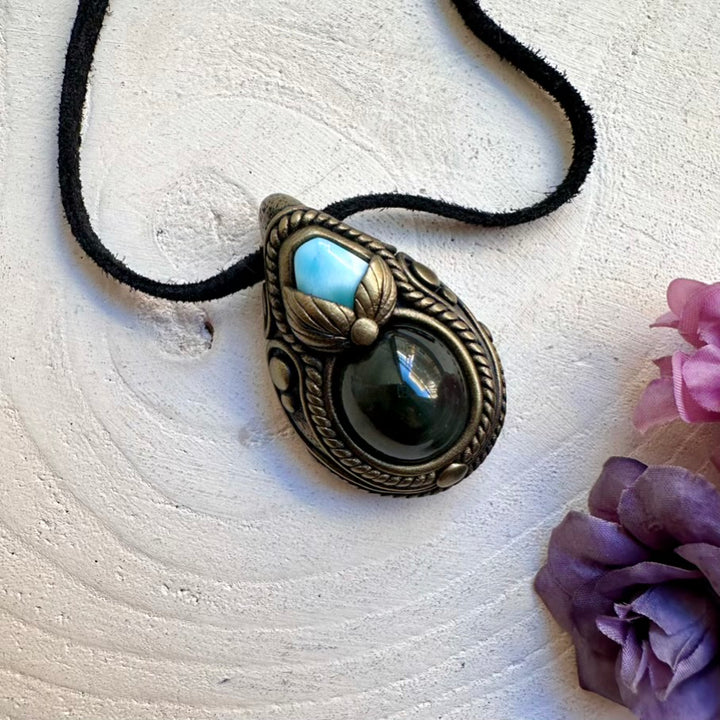 Spiritual protection necklace featuring natural imperfect Rainbow Obsidian rainbow sheen and soothing Larimar energy.